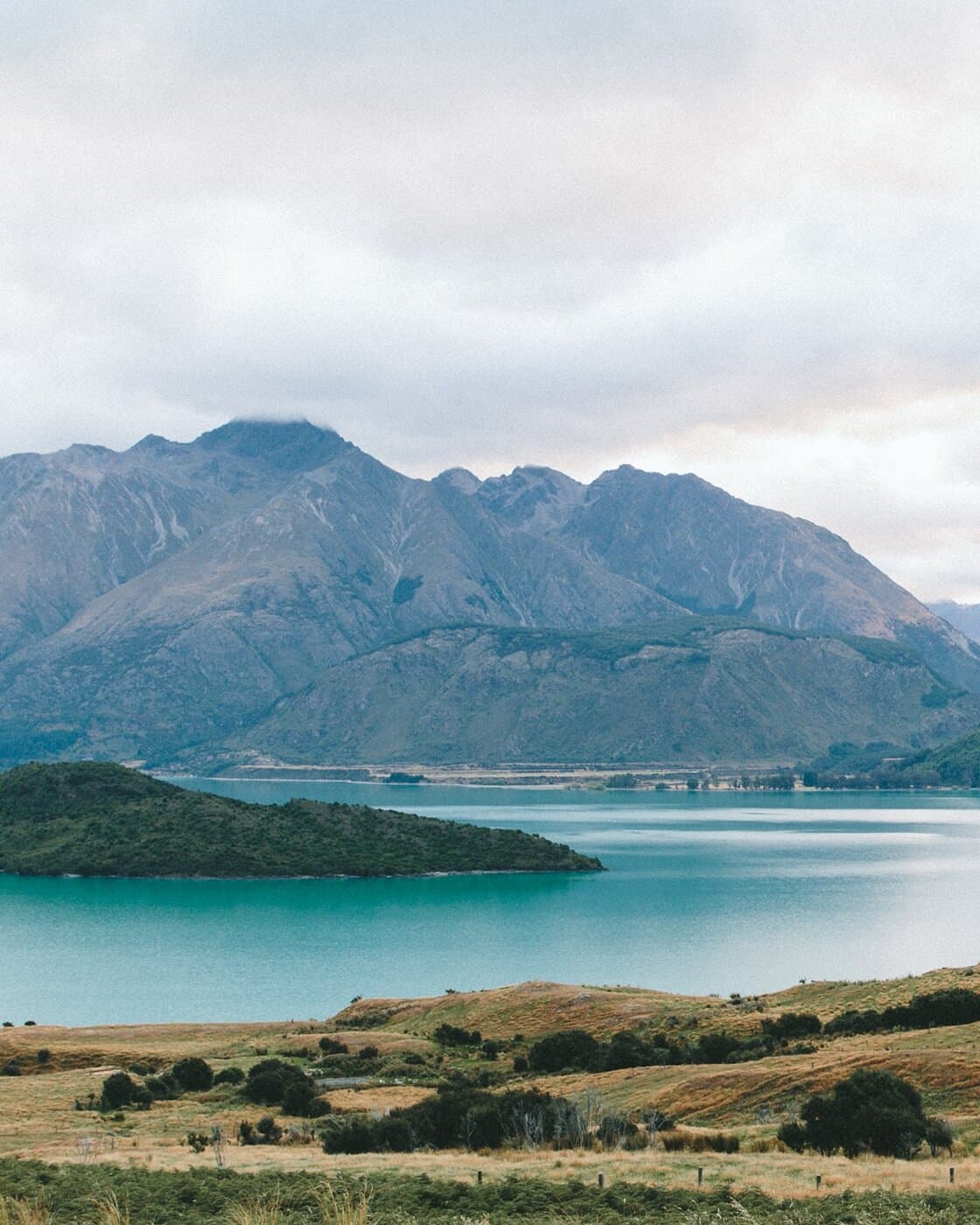 Mountain landscape beside a lake.